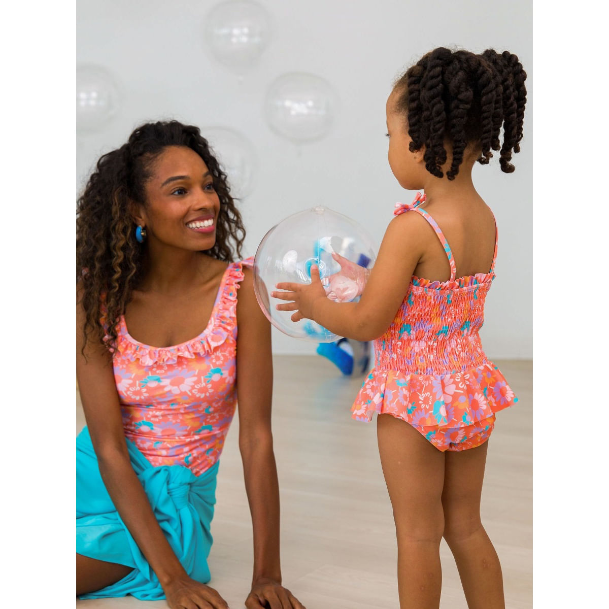 RuffleButts---RuggedButts-Peplum-Smocked-Bodice-One-Piece---Girls--Coral-Floral